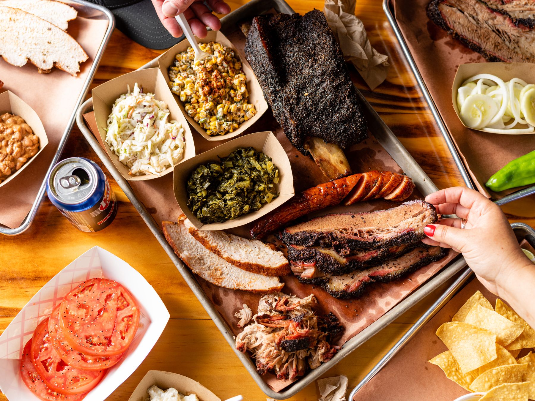 Full spread of smoked meats and sides